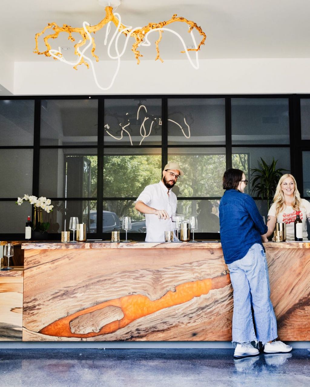 The tasting bar at Hope on Park, with people at the counter